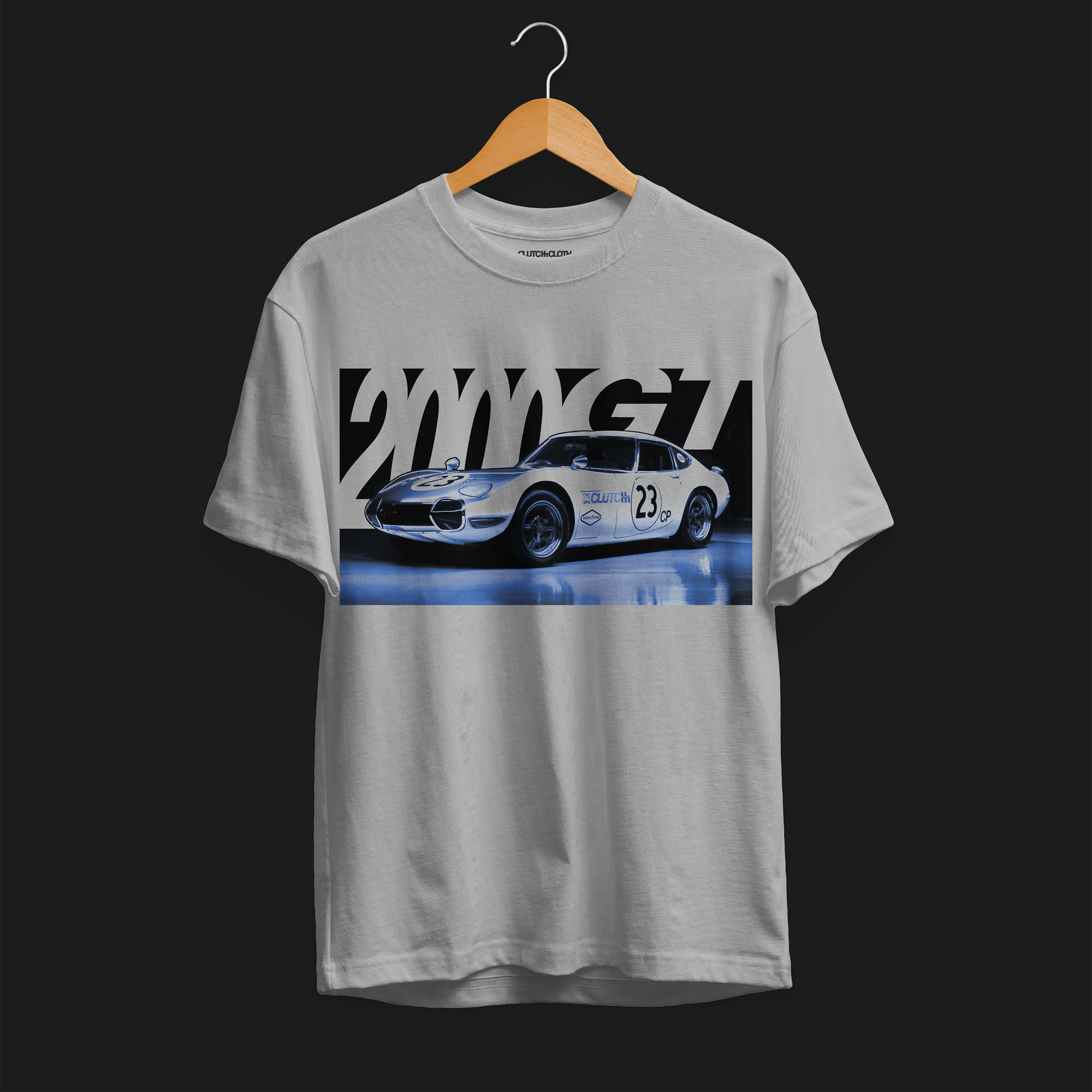 2000GT Automotive Graphic T-Shirt – grey tee featuring a detailed graphic of the legendary Toyota 2000GT race car with bold "2000GT" lettering. Perfect gift for JDM and car culture enthusiasts.