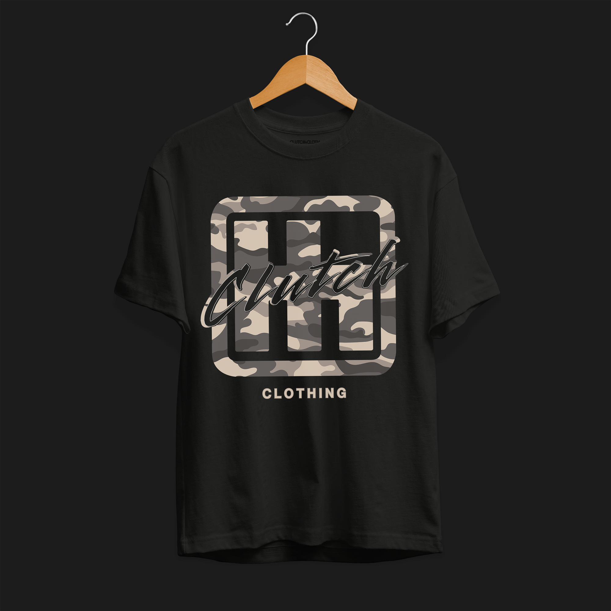 Clutch Clothing Camo Automotive Graphic T-Shirt – Front view of black camo-patterned Clutch Clothing graphic tee. Ideal for car enthusiasts and streetwear lovers.