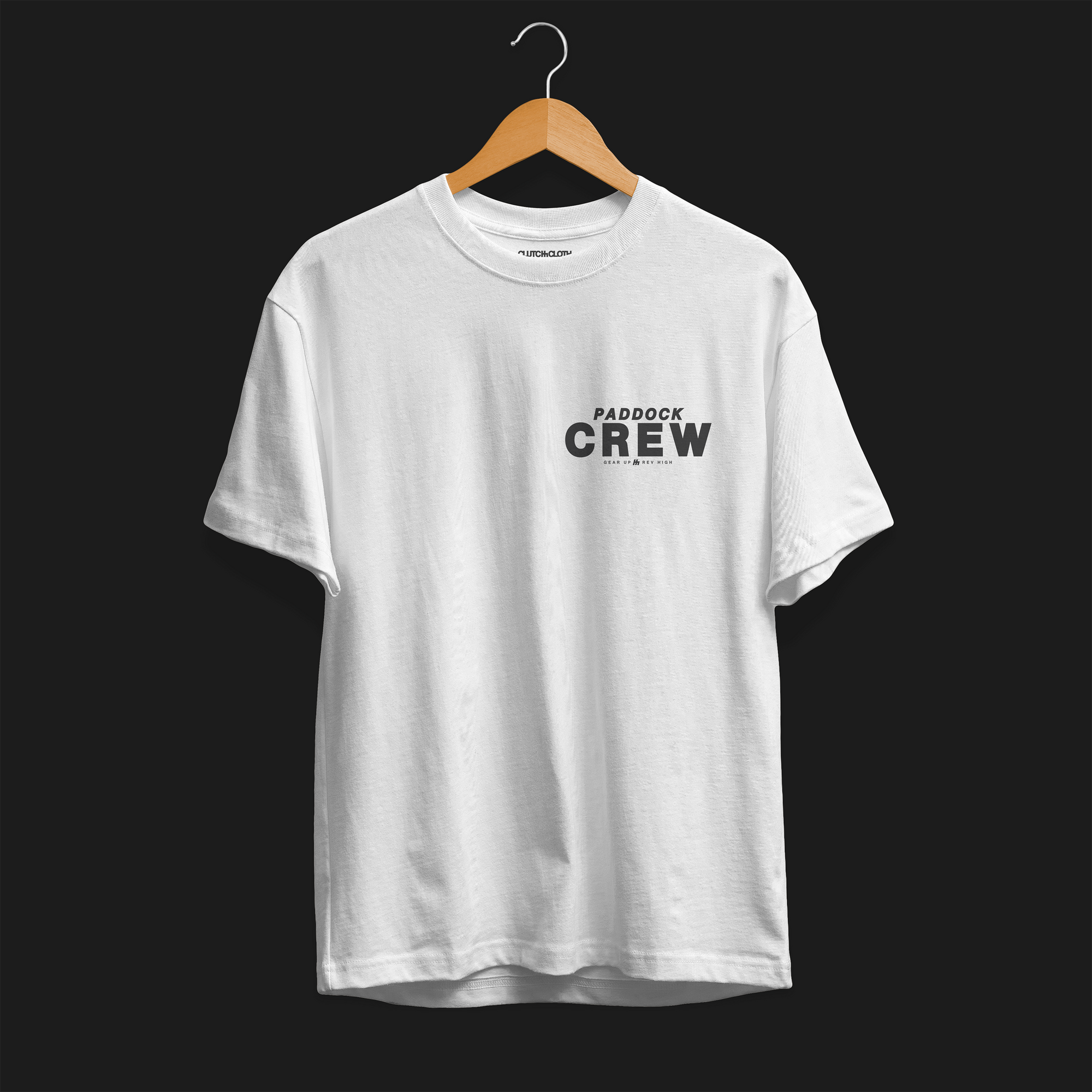 Paddock Crew Automotive T-Shirt – front view of white Paddock Crew graphic tee featuring bold "Paddock Crew" text and "Gear Up, Rev High" tagline. Perfect gift for motorsport and car culture enthusiasts.