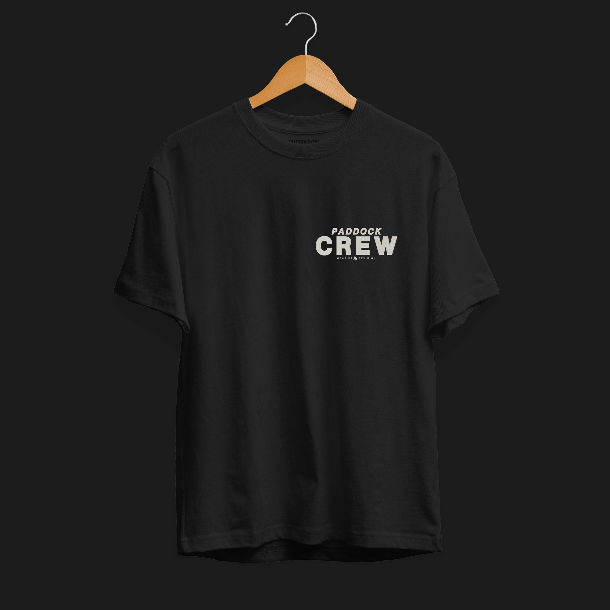 Paddock Crew Automotive T-Shirt –front view of dark grey Paddock Crew graphic tee featuring bold "Paddock Crew" text and "Gear Up, Rev High" tagline. Perfect gift for motorsport and car culture enthusiasts.