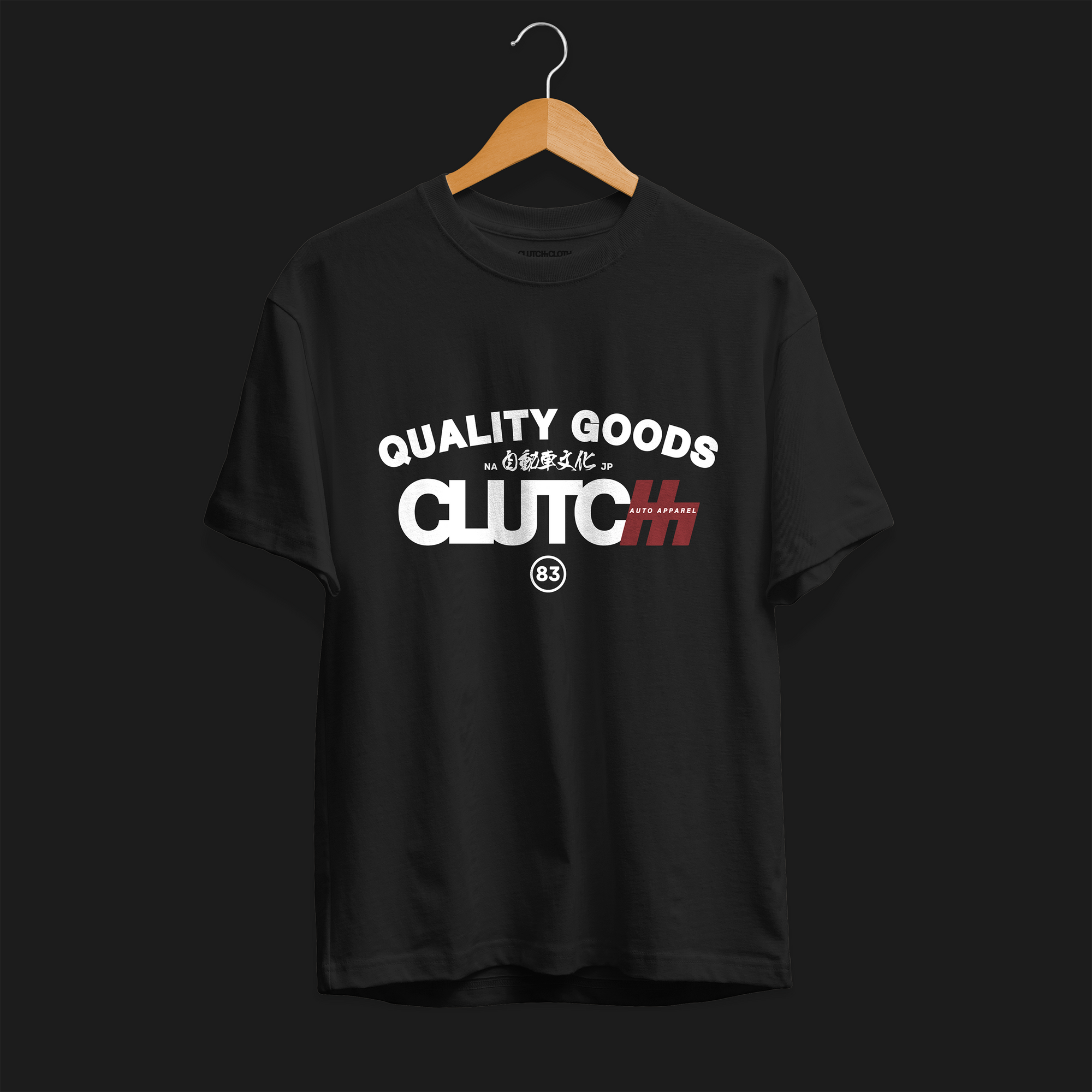 Quality Goods Car Culture 83 Automotive Graphic T-Shirt – Black tee with "Quality Goods" and "Clutch Auto Apparel" text, accented with Japanese characters and red highlights. Perfect gift for car enthusiasts and streetwear fans.