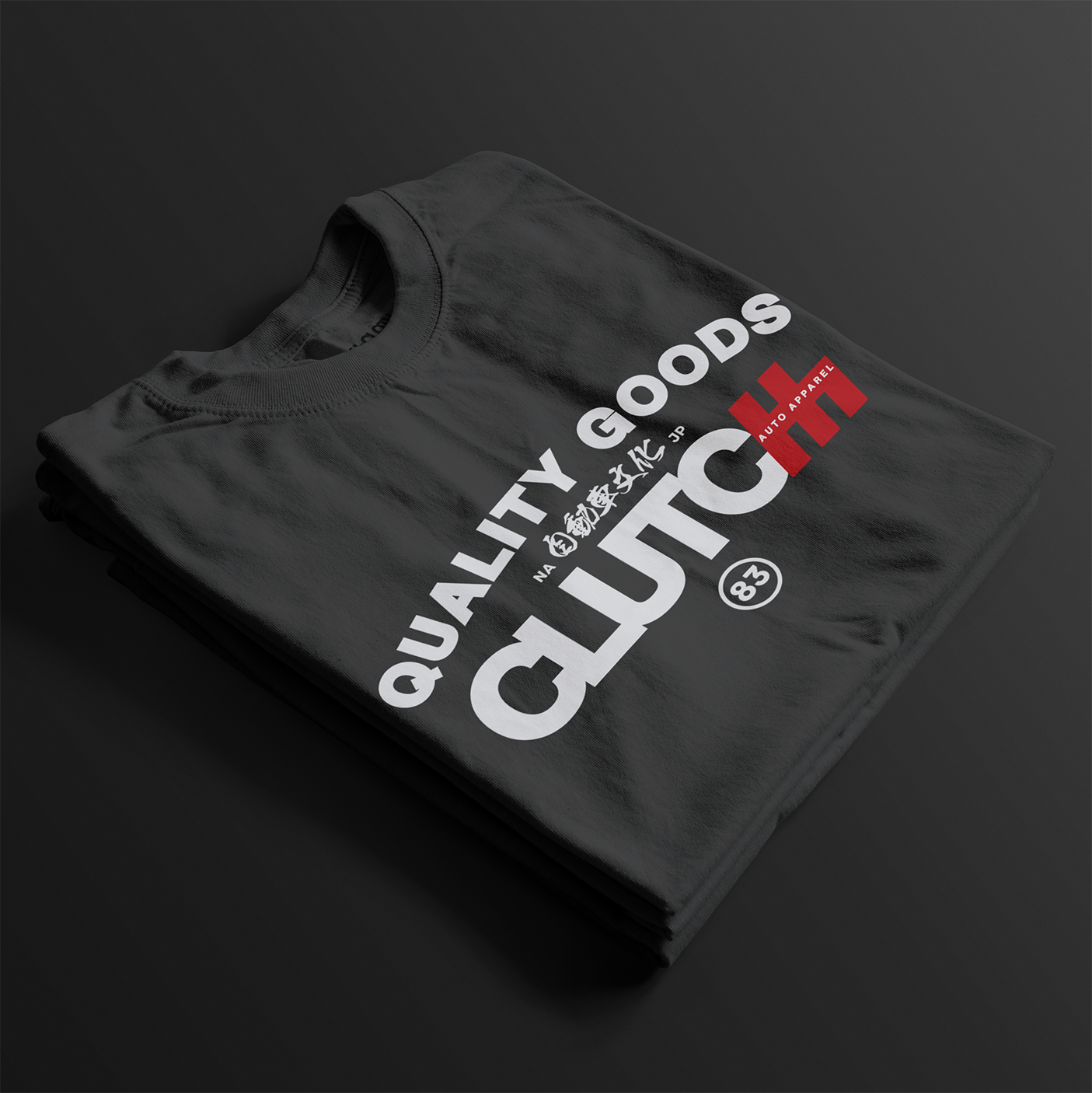 Quality Goods Car Culture 83 Automotive Graphic T-Shirt – Folded Black tee with "Quality Goods" and "Clutch Auto Apparel" text, accented with Japanese characters and red highlights. Perfect gift for car enthusiasts and streetwear fans.