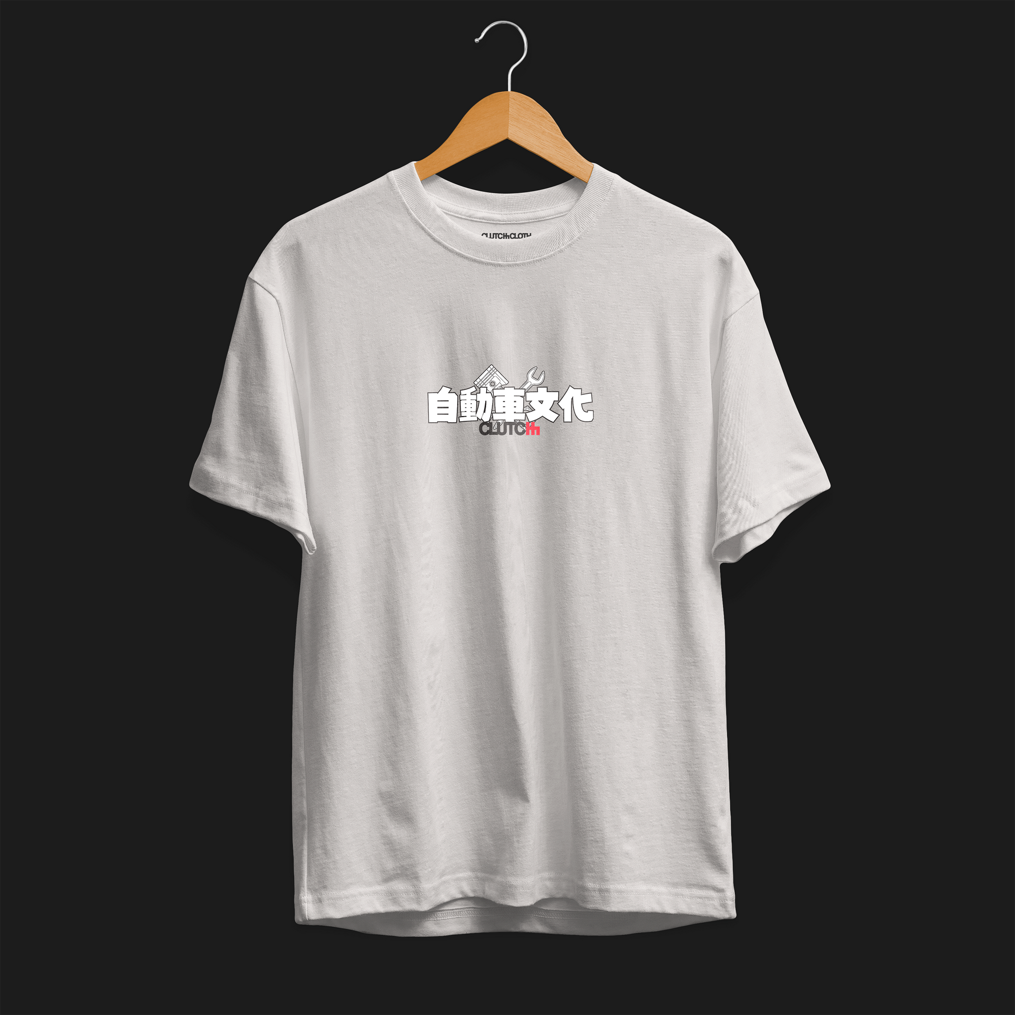 Front angle of Retro Masterpiece Car Culture Automotive Graphic T-Shirt – Beige unisex tee featuring a retro-inspired supercar design with Japanese text and cityscape. A perfect gift for vintage car lovers and JDM enthusiasts.